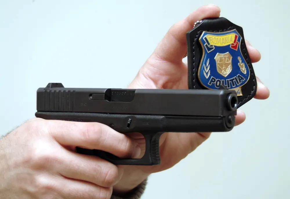 Un polițist din județul Giurgiu a fost găsit împușcat în cap 