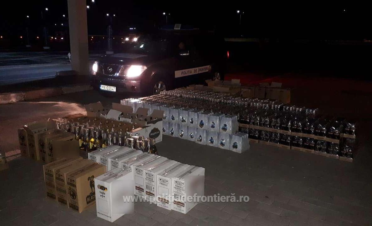 2.766 de sticle cu alcool, ascunse în compartimentul de marfă al unui microbuz