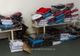 Textile și încălțăminte, contrafăcute, confiscate de polițiștii de frontieră